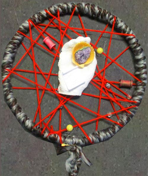 Dreamcatcher with red string and beads